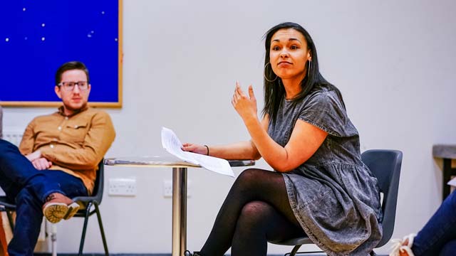 A young, black woman leads a theatre-making workshop